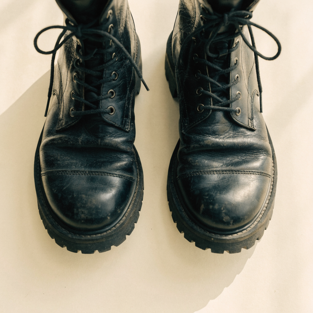 Black combat boots, broken in